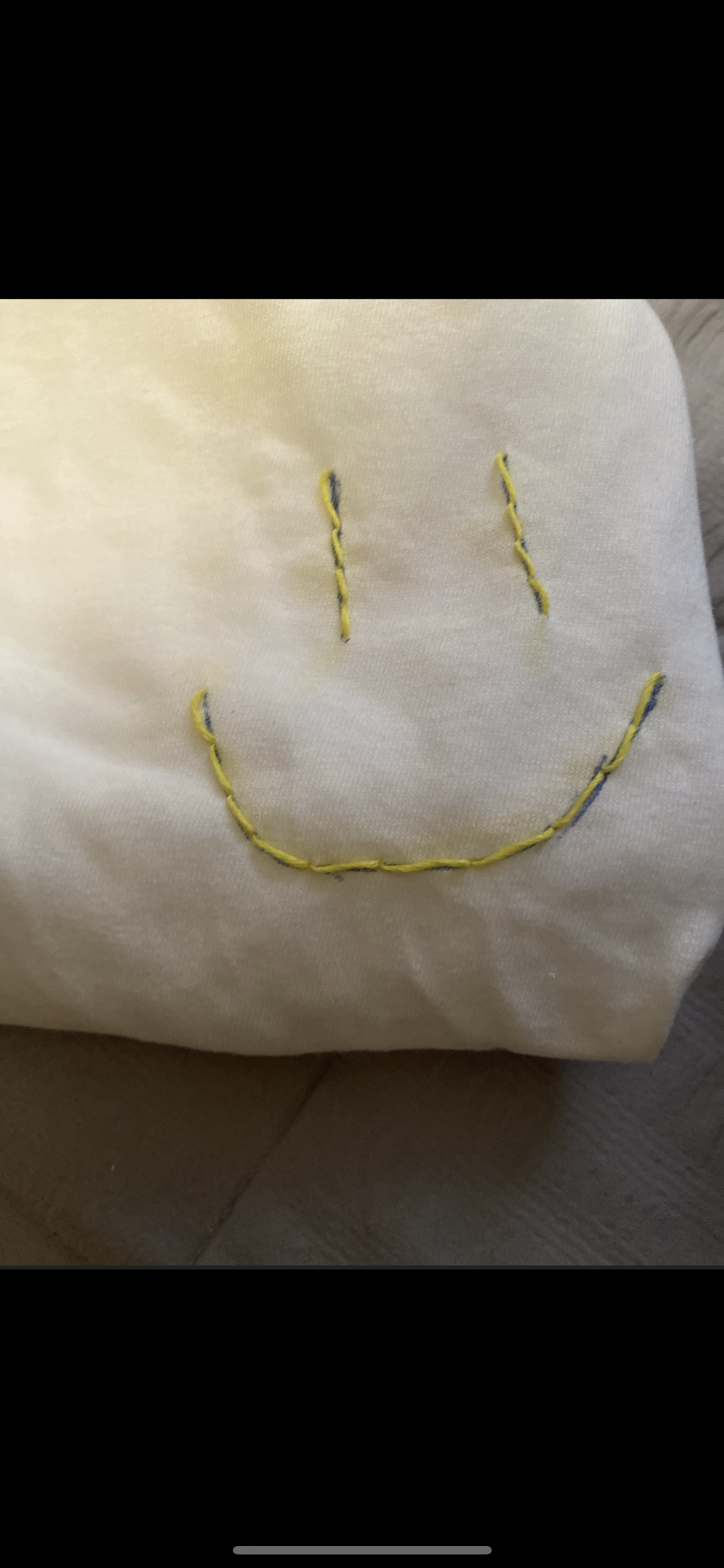 Hand Embroidered Smiley face design
